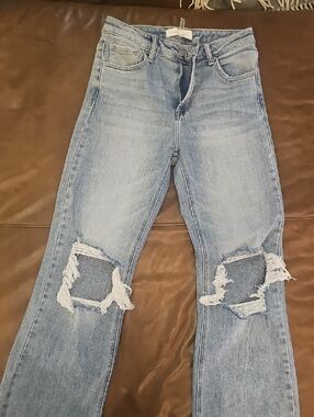 Distressed Light Blue Straight Leg Women’s Jeans